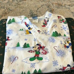 Disney’s scrubs size large holiday print, mini and Mickey double pocket